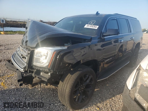 2019 GMC Yukon XL SLT with VIN 1GKS1GKC5KR327079, listed as a Copart auction lot 66189284 with 115,038 mi miles and Salvage Title. Bid and sale history available at carsss.com. Image 1.