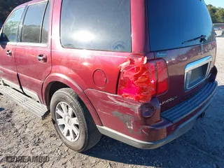 2004 Lincoln Navigator Luxury with VIN 5LMFU27R64LJ13317, listed as a IAAI auction lot 40598909 with 240,131 mi miles. Bid and sale history available at carsss.com. Image 6.