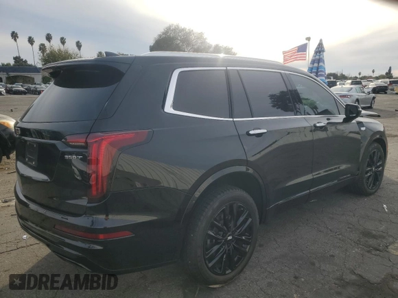 2021 Cadillac XT6 Luxury with VIN 1GYKPAR46MZ235367, listed as a Copart auction lot 84516834 with 73,448 mi miles and Salvage title. Bid and sale history available at DreamBid. Image 3.