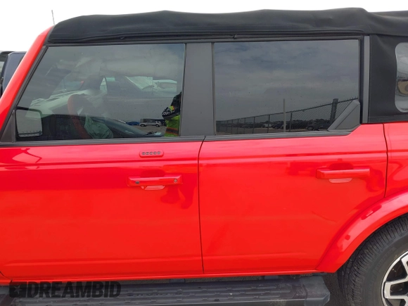 2022 Ford Bronco z VIN 1FMDE5DH7NLA98557, wystawiony jako IAAI lot #41746093 z przebiegiem 61 718 mil mil oraz . Historia ofert i sprzedaży dostępna na DreamBid. Obrazek 15.
