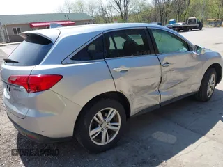 2014 Acura RDX Technology with VIN 5J8TB4H56EL002194, listed as a IAAI auction lot 42096037 with 209,439 mi miles and . Bid and sale history available at DreamBid. Image 4.