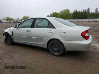 2004 Toyota Camry LE with VIN 4T1BE30K64U323377, listed as a Copart auction lot 58249465 with 274,902 mi miles and Salvage title. Bid and sale history available at DreamBid. Image 2.