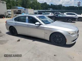 2012 BMW 7 Series 750i with VIN WBAKA8C50CDV99875, listed as a Copart auction lot 61663985 with 145,289 mi miles and Clean title. Bid and sale history available at DreamBid. Image 4.