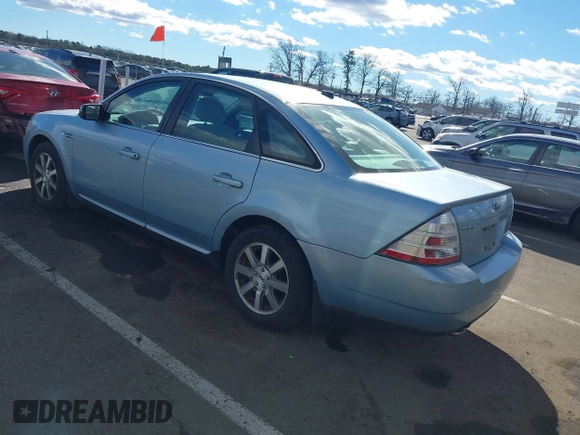 2008 Ford Taurus SEL with VIN 1FAHP27WX8G157077, listed as a IAAI auction lot 41499882 with 113,039 mi miles. Bid and sale history available at carsss.com. Image 3.
