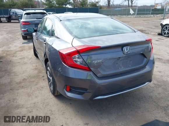 2019 Honda Civic LX with VIN 19XFC2F61KE037495, listed as a IAAI auction lot 41891007 with 90,262 mi miles and . Bid and sale history available at DreamBid. Image 3.