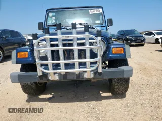 2000 Jeep Wrangler Sport with VIN 1J4FA49S9YP742414, listed as a Copart auction lot 61471065 with 139,572 mi miles and Clean title. Bid and sale history available at DreamBid. Image 5.