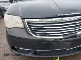 2012 Chrysler Town & Country Touring z VIN 2C4RC1BG7CR308730, wystawiony jako IAAI lot #41868726 z przebiegiem 250 606 mil mil oraz . Historia ofert i sprzedaży dostępna na DreamBid. Obrazek 12.