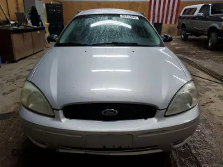 2004 Ford Taurus SE with VIN 1FAFP53224G175353, listed as a Copart auction lot 52713935 with 213,375 mi miles and Salvage Title. Bid and sale history available at DreamBid. Image 5.