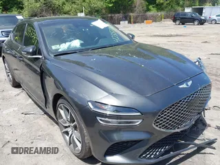 2022 Genesis G70 2.0T z VIN KMTG34TA7NU101863, wystawiony jako IAAI lot #42337387 z przebiegiem 51 396 mil mil oraz . Historia ofert i sprzedaży dostępna na DreamBid. Obrazek 1.