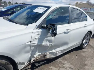 2015 BMW 3 Series 328i with VIN WBA3C1C5XFK117788, listed as a IAAI auction lot 41752178 with 154,030 mi miles and . Bid and sale history available at carsss.com. Image 6.