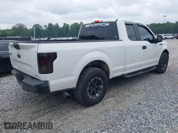2015 Ford F-150 XL with VIN 1FTEX1C8XFFA75822, listed as a IAAI auction lot 42430498 with 197,181 mi miles and . Bid and sale history available at DreamBid. Image 4.