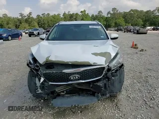 2018 Kia Sorento L z VIN 5XYPG4A35JG342050, wystawiony jako Copart lot #54517715 z przebiegiem 121 415 mil mil oraz Szkoda całkowita • Salvage title. Historia ofert i sprzedaży dostępna na DreamBid. Obrazek 14.