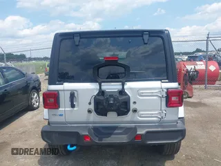 2023 Jeep Wrangler Sahara with VIN 1C4JJXP69PW695915, listed as a IAAI auction lot 42662028 with 36,957 mi miles and . Bid and sale history available at DreamBid. Image 16.