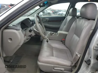 2001 Chevrolet Impala with VIN 2G1WF52E619288458, listed as a Copart auction lot 44365025 with 128,458 mi miles and Salvage title. Bid and sale history available at DreamBid. Image 7.