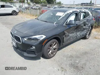 2019 BMW X2 sDrive28i with VIN WBXYJ3C58KEP77334, listed as a IAAI auction lot 42575165 with 98,910 mi miles and . Bid and sale history available at DreamBid. Image 2.