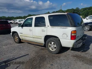 2003 Chevrolet Tahoe LS z VIN 1GNEC13Z83J195493, wystawiony jako IAAI lot #42472037 z przebiegiem 228 016 mil mil oraz . Historia ofert i sprzedaży dostępna na DreamBid. Obrazek 3.