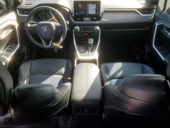 2021 Toyota RAV4 Hybrid XSE with VIN 4T3E6RFV1MU057403, listed as a Copart auction lot 47809415 with 56,570 mi miles and Salvage Title. Bid and sale history available at carsss.com. Image 8.