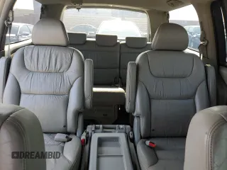 2006 Honda Odyssey EX-L z VIN 5FNRL38756B087695, wystawiony jako Copart lot #60122525 z przebiegiem 213 221 mil mil oraz Szkoda całkowita • Salvage title. Historia ofert i sprzedaży dostępna na DreamBid. Obrazek 10.