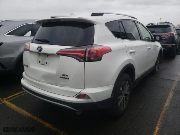 2016 Toyota RAV4 Hybrid XLE with VIN JTMRJREV7GD051091, listed as a Copart auction lot 73675162 with 168,832 mi miles. Bid and sale history available at carsss.com. Image 3.