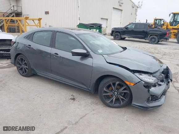 2018 Honda Civic Hatchback Sport Touring with VIN SHHFK7H93JU223988, listed as a IAAI auction lot 41824281 with 65,770 mi miles. Bid and sale history available at carsss.com. Image 1.
