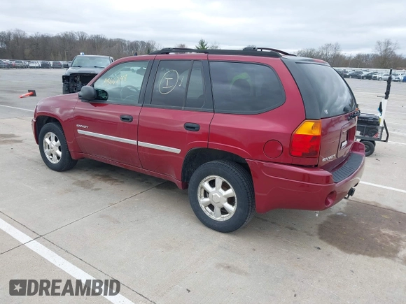 2006 GMC Envoy SLE with VIN 1GKDT13S262175296, listed as a IAAI auction lot 41866248 with 249,830 mi miles. Bid and sale history available at carsss.com. Image 3.