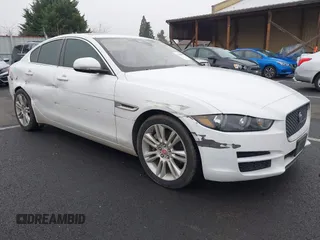 2019 Jaguar XE 25t with VIN SAJAR4FX0KCP52659, listed as a IAAI auction lot 41332080 with 96,936 mi miles. Bid and sale history available at carsss.com. Image 1.