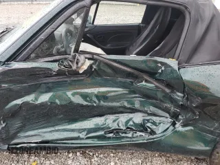 2001 Mazda MX-5 Miata z VIN JM1NB353610200693, wystawiony jako Copart lot #55385725 z przebiegiem 98 777 mil mil oraz Szkoda całkowita • Salvage title. Historia ofert i sprzedaży dostępna na DreamBid. Obrazek 7.