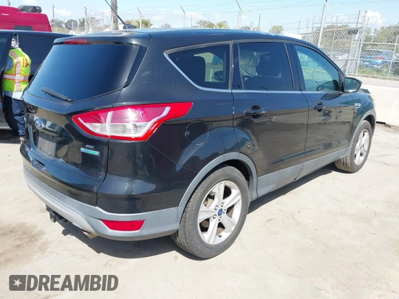 2015 Ford Escape SE with VIN 1FMCU0G91FUA18588, listed as a IAAI auction lot 41958047 with 111,523 mi miles. Bid and sale history available at carsss.com. Image 4.