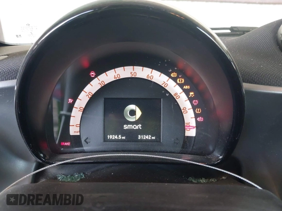 2017 Smart fortwo Pure z VIN WMEFJ9BA8HK231165, wystawiony jako IAAI lot #42238753 z przebiegiem 31 242 mil mil oraz . Historia ofert i sprzedaży dostępna na DreamBid. Obrazek 7.