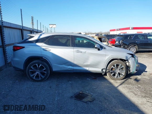 2018 Lexus RX 350 z VIN 2T2ZZMCA6JC096728, wystawiony jako IAAI lot #41356629 z przebiegiem 76 982 mil mil oraz . Historia ofert i sprzedaży dostępna na DreamBid. Obrazek 13.