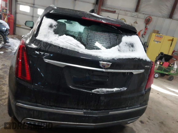2021 Cadillac XT5 FWD Premium Luxury with VIN 1GYKNCRS3MZ198651, listed as a IAAI auction lot 41607734 with 49,275 mi miles. Bid and sale history available at carsss.com. Image 16.