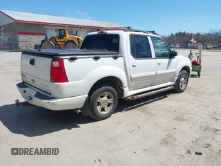 2004 Ford Explorer Sport Trac XLS z VIN 1FMDU77K94UC07938, wystawiony jako IAAI lot #42099383 z przebiegiem 232 789 mil mil oraz . Historia ofert i sprzedaży dostępna na DreamBid. Obrazek 4.