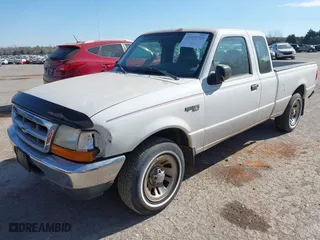1999 Ford Ranger XL with VIN 1FTYR14V3XPB52957, listed as a IAAI auction lot 41850710 with 169,476 mi miles. Bid and sale history available at carsss.com. Image 2.