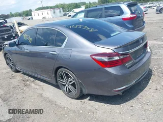 2017 Honda Accord Touring with VIN 1HGCR3F98HA015928, listed as a IAAI auction lot 42553437 with 168,902 mi miles and . Bid and sale history available at DreamBid. Image 3.
