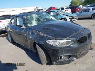 2014 BMW 2 Series M235i with VIN WBA1J7C50EVX33903, listed as a IAAI auction lot 40207684 with 81,766 mi miles and . Bid and sale history available at carsss.com. Image 1.