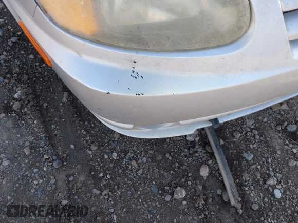 2005 Hyundai Accent GLS z VIN KMHCG45C25U623618, wystawiony jako IAAI lot #42140996 z przebiegiem 184 852 mil mil oraz . Historia ofert i sprzedaży dostępna na DreamBid. Obrazek 13.