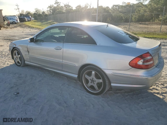 2003 Mercedes-Benz CLK-Class 5.0L with VIN WDBTJ75JX3F052823, listed as a Copart auction lot 87321334 with 132,774 mi miles and Salvage Title. Bid and sale history available at carsss.com. Image 2.