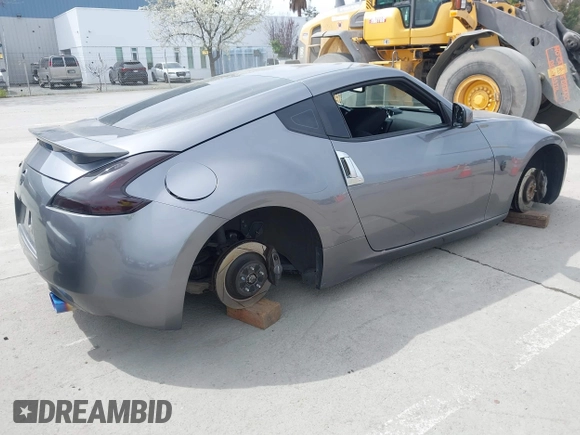 2012 Nissan 370Z Touring with VIN JN1AZ4EH4CM561415, listed as a IAAI auction lot 41838948 with 111,298 mi miles. Bid and sale history available at carsss.com. Image 4.