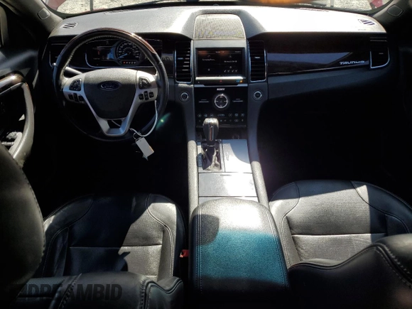 2013 Ford Taurus Limited z VIN 1FAHP2F84DG217500, wystawiony jako Copart lot #64268005 z przebiegiem 120 277 mil mil oraz Szkoda całkowita • Salvage title. Historia ofert i sprzedaży dostępna na DreamBid. Obrazek 8.