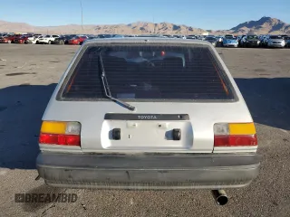 1987 Toyota Corolla с VIN 1NXAE87G6HZ400863, выставлен на аукционе Copart как лот 46637575 с пробегом 241 705 миль миль и Списание • Salvage title. История ставок и продаж доступна на DreamBid. Изображение 6.