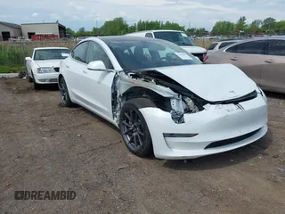 2020 Tesla Model 3 Standard Range Plus z VIN 5YJ3E1EA3LF794276, wystawiony jako IAAI lot #42390409 z przebiegiem 51 924 mil mil oraz . Historia ofert i sprzedaży dostępna na DreamBid. Obrazek 1.