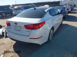 2015 Kia Optima EX with VIN 5XXGN4A73FG377402, listed as a IAAI auction lot 41209243 with 217,948 mi miles. Bid and sale history available at carsss.com. Image 4.