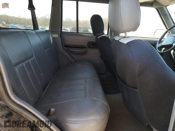 1997 Jeep Cherokee Country with VIN 1J4FJ78S2VL574492, listed as a Copart auction lot 88568685 with 244,465 mi miles and Salvage Title. Bid and sale history available at carsss.com. Image 10.
