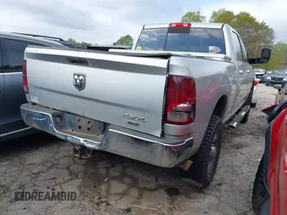2016 Ram 2500 SLT with VIN 3C6UR5DL9GG210991, listed as a IAAI auction lot 41832164 with 215,098 mi miles. Bid and sale history available at carsss.com. Image 4.