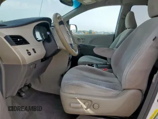 2014 Toyota Sienna LE AAS with VIN 5TDKK3DC0ES433847, listed as a Copart auction lot 63260025 with 160,130 mi miles and Salvage title. Bid and sale history available at DreamBid. Image 7.