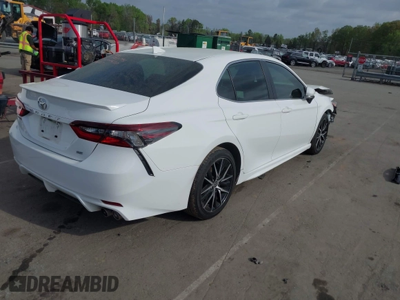 2022 Toyota Camry SE with VIN 4T1G11AK6NU066677, listed as a IAAI auction lot 41892982 with 71,059 mi miles and . Bid and sale history available at carsss.com. Image 4.