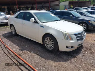 2010 Cadillac CTS Luxury z VIN 1G6DE5EG2A0122918, wystawiony jako IAAI lot #42251548 z przebiegiem 214 060 mil mil oraz . Historia ofert i sprzedaży dostępna na DreamBid. Obrazek 1.