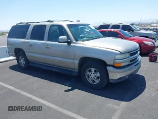 2001 Chevrolet Suburban LT z VIN 3GNFK16T51G143770, wystawiony jako IAAI lot #42321218 z przebiegiem 311 654 mil mil oraz . Historia ofert i sprzedaży dostępna na DreamBid. Obrazek 1.