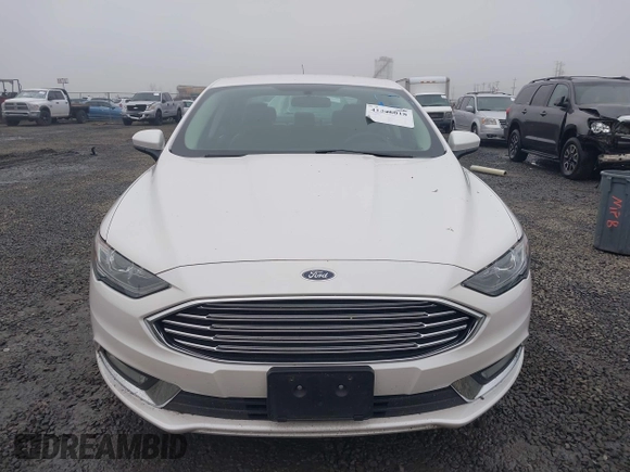 2017 Ford Fusion SE z VIN 3FA6P0H71HR201799, wystawiony jako IAAI lot #41346018 z przebiegiem 51 126 mil mil oraz . Historia ofert i sprzedaży dostępna na DreamBid. Obrazek 12.