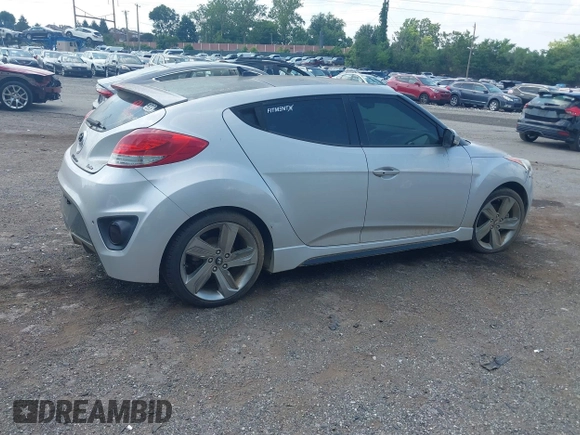 2013 Hyundai Veloster Turbo with VIN KMHTC6AE1DU177023, listed as a IAAI auction lot 42604617 with 102,087 mi miles and . Bid and sale history available at DreamBid. Image 4.